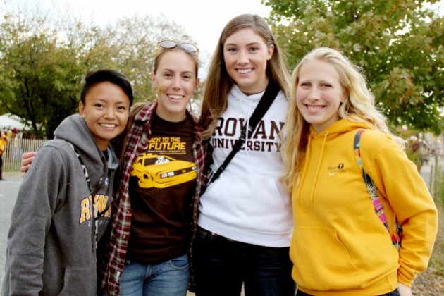 Four Rowan students smiling
