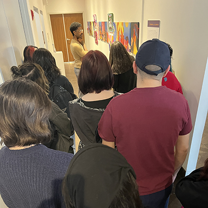 Devan Shimoyama critiques student artwork.