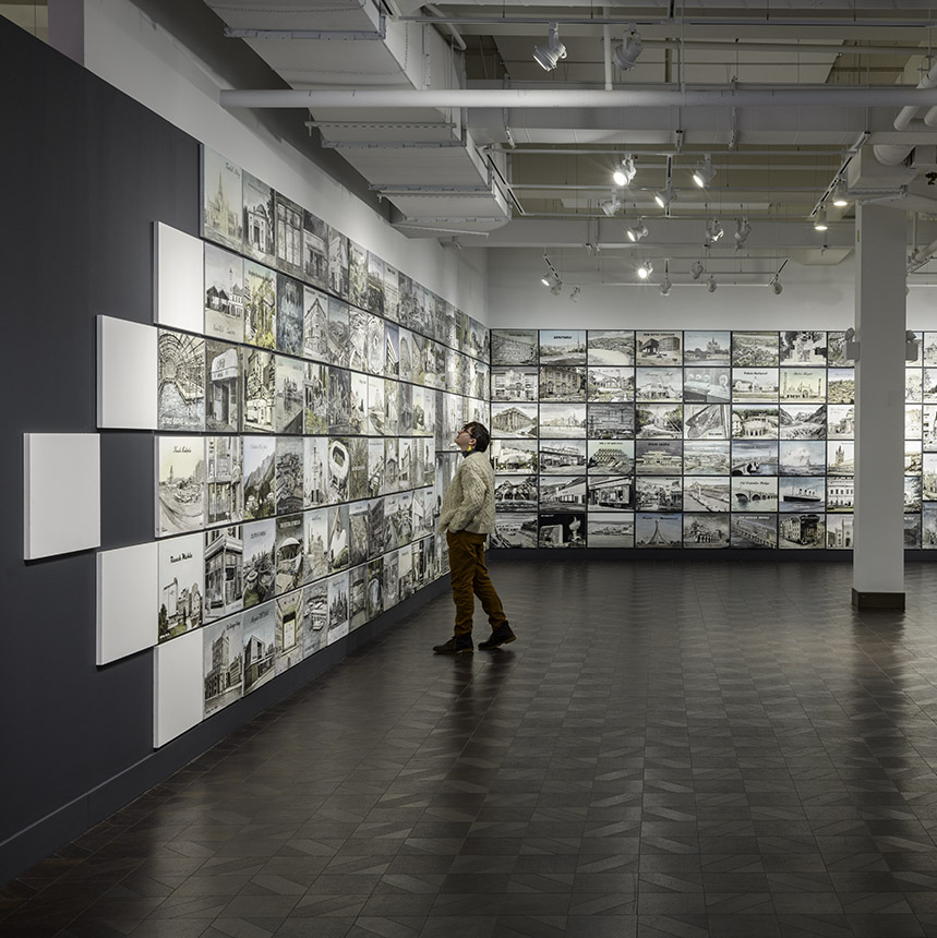 Visitor viewing The Disappointed Tourist exhibition.