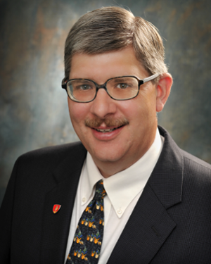 A headshot photo featuring William Kocher, MD, senior associate dean for admissions at CMSRU.