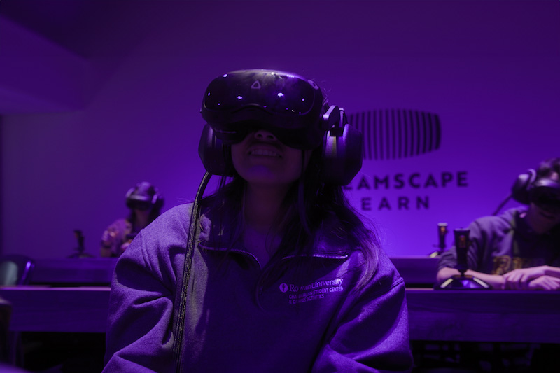 A student wearing a VR headset in Rowan's Dreamscape.