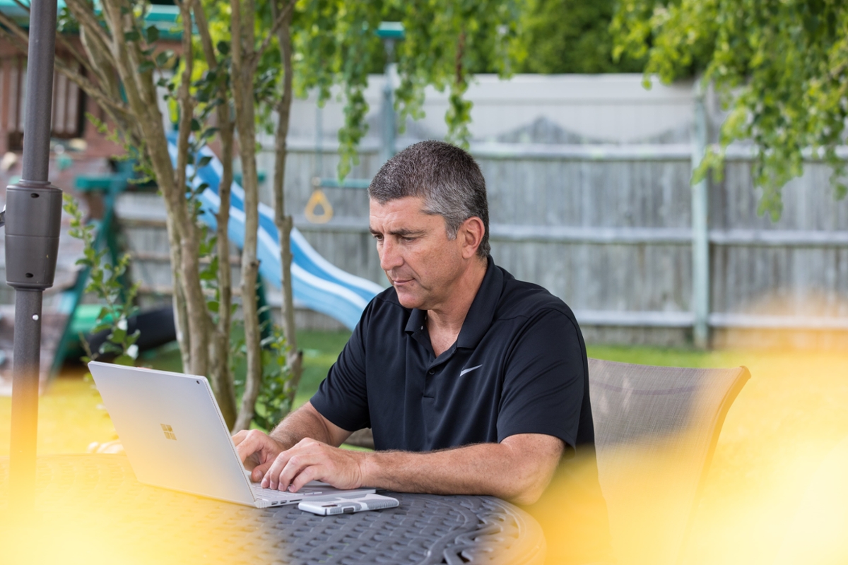 A student works on their laptop.