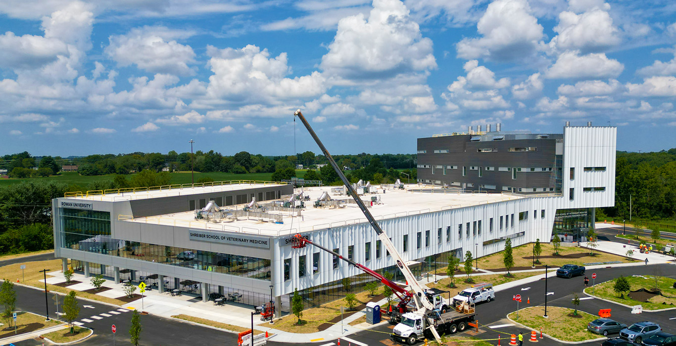Installation of the Shreiber School of Veterinary Medicine building sign at Rowan University.