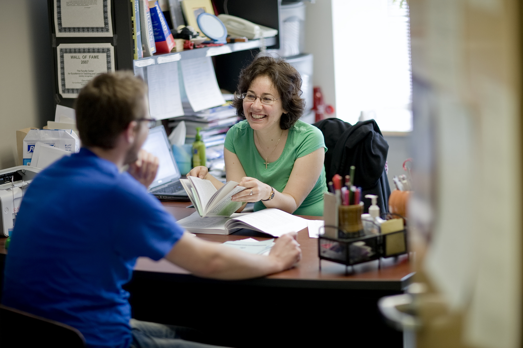 A professor mentoring a student