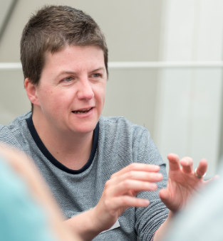 Heath Kelly describing something with his hands.