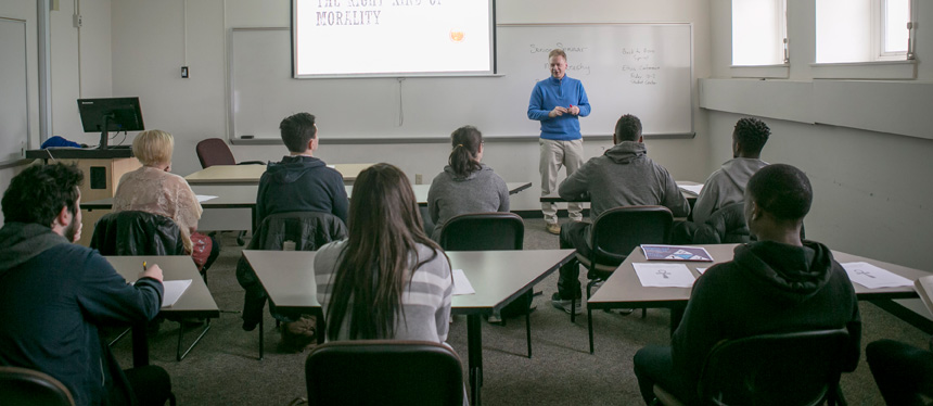 Faculty member teaches Philosophy class