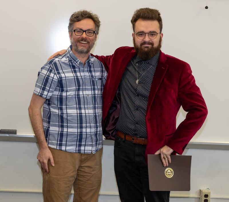 Dawson Kipphut receiving the 2023 PHWR Senior of Distinction in Philosophy Award