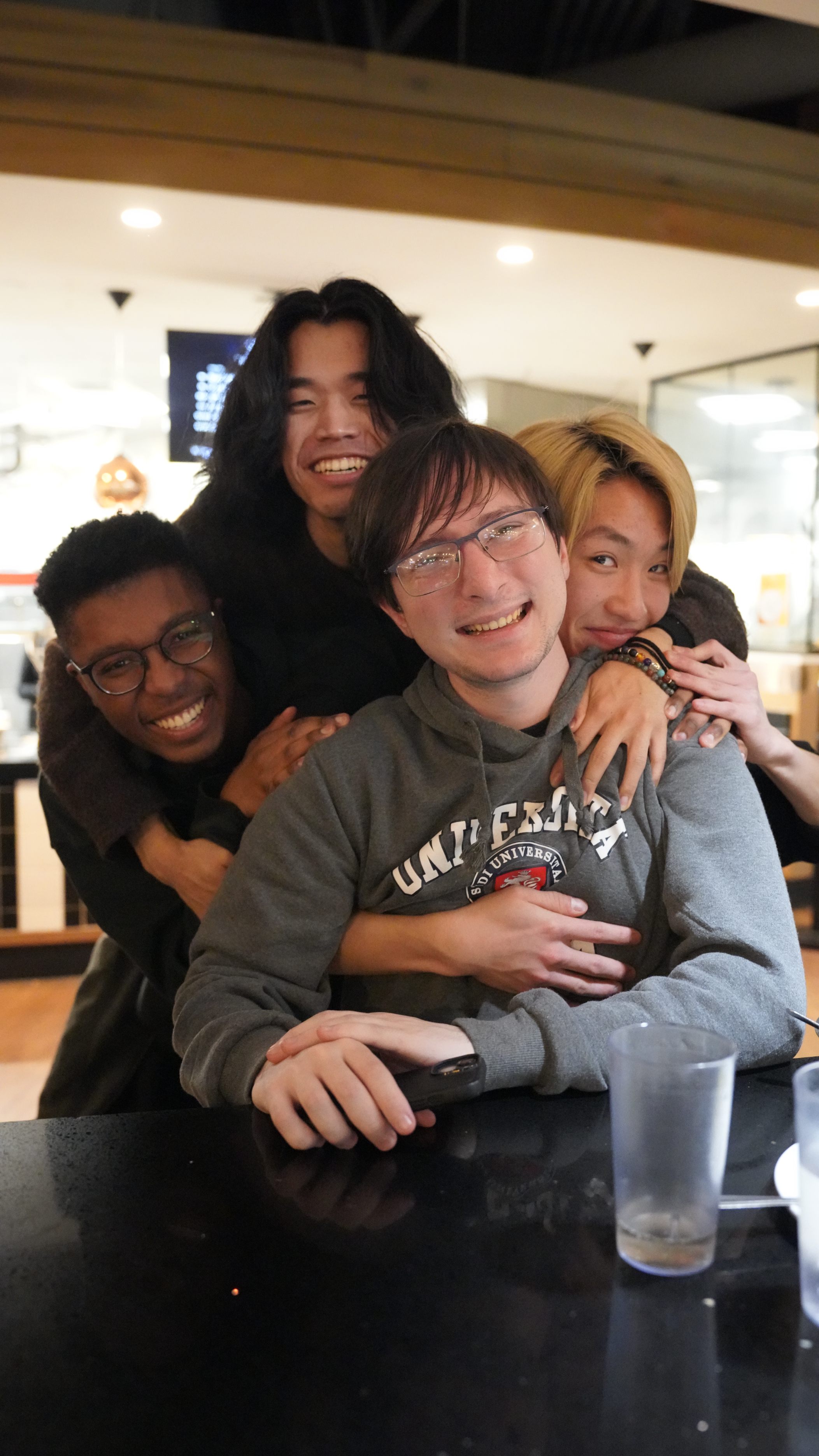 JCC members and exchange students smiling.