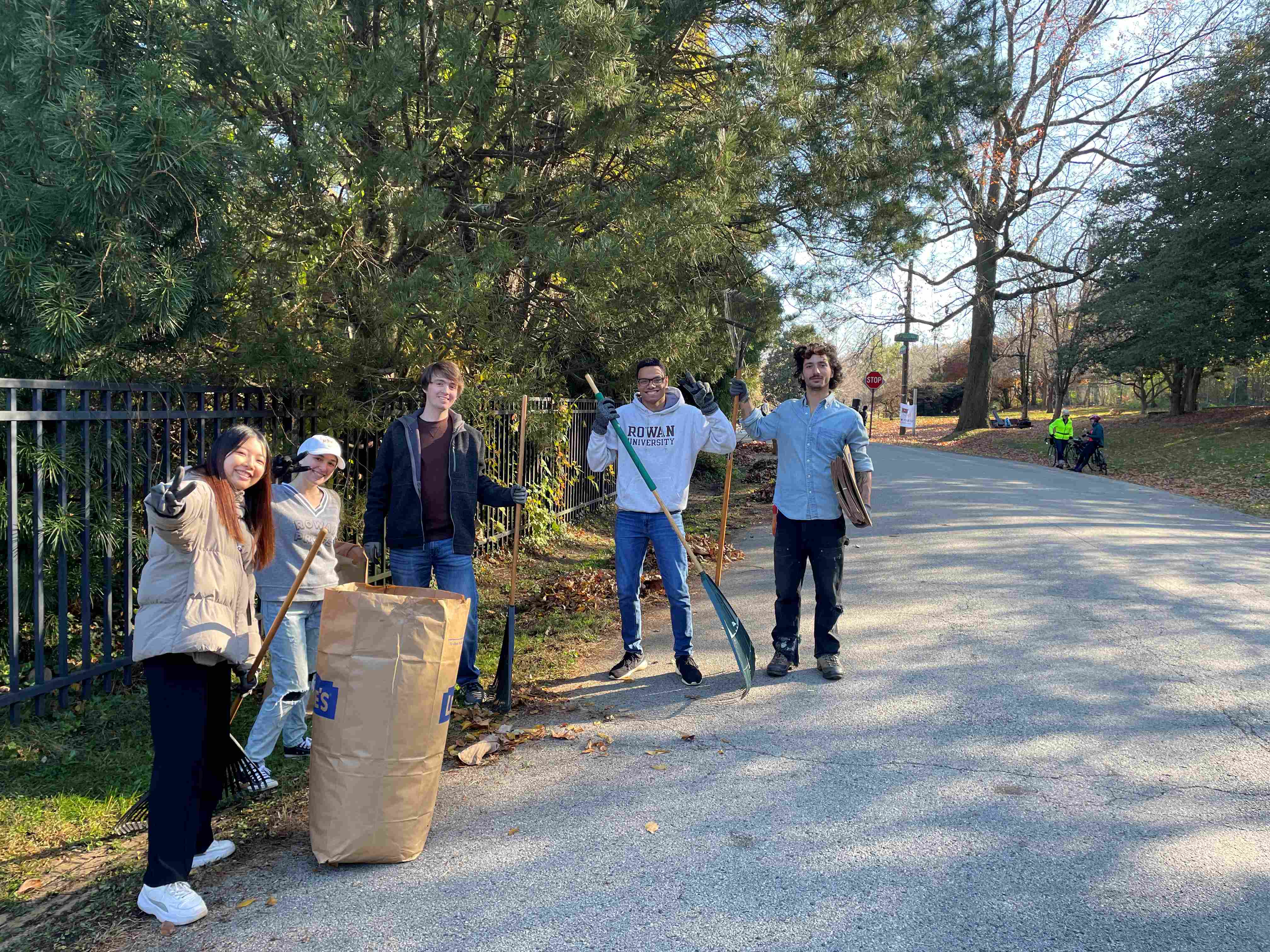 Students cleaning the garden.