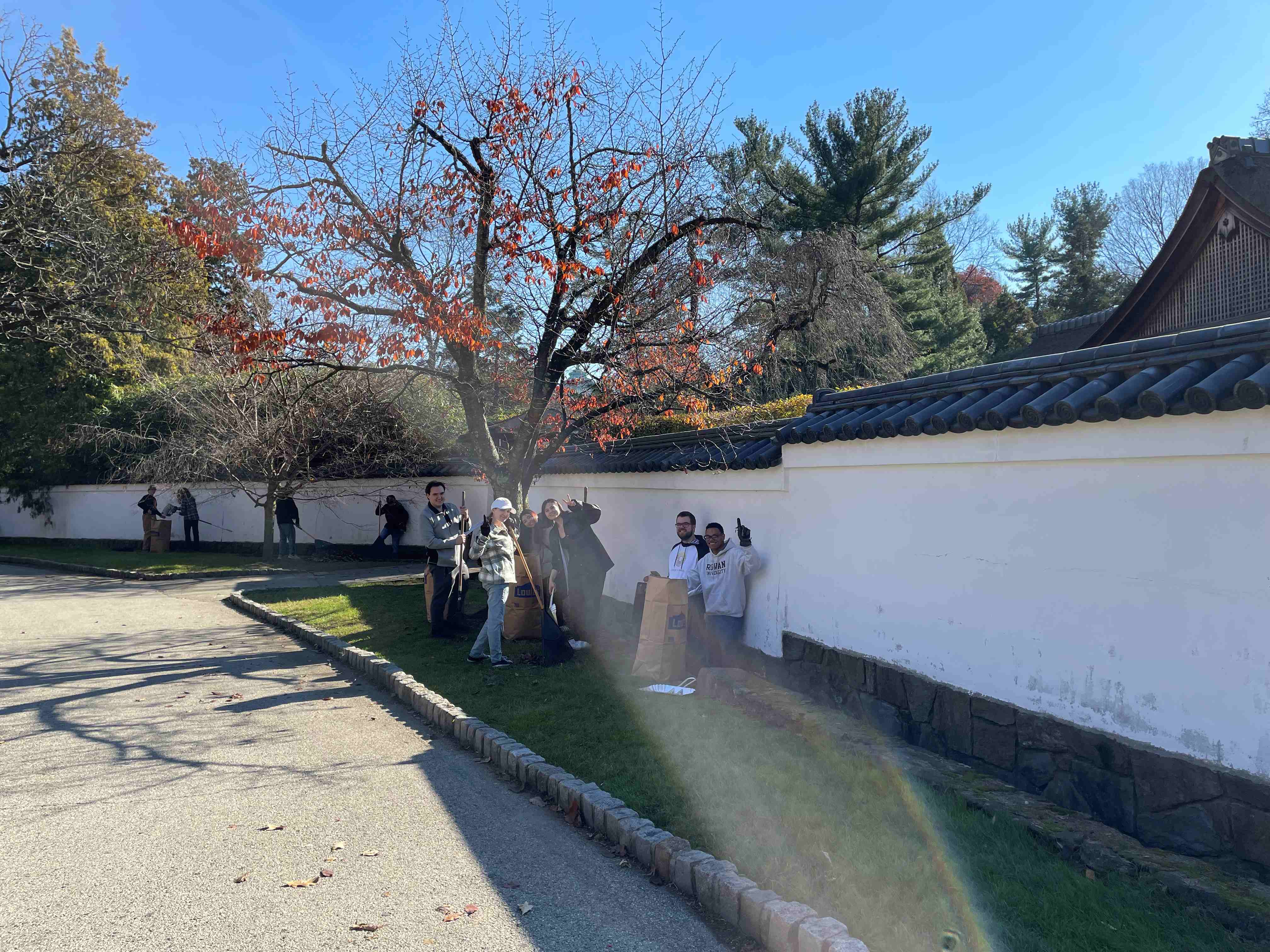 Students cleaning the garden.