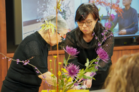 Mrs. Mariko Ono demonstrating her Ikebana creations with Professor Matsumura Dusk.