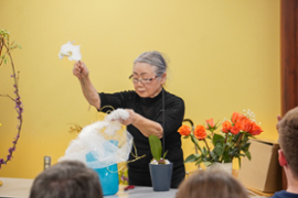 Mrs. Mariko Ono demonstrating her Ikebana creations with Professor Matsumura Dusk.