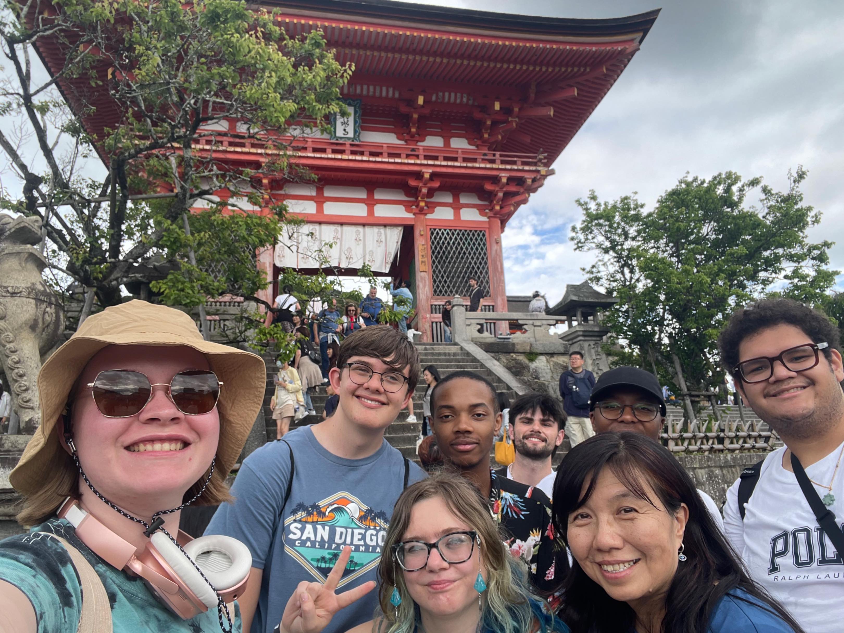 Study abroad group in front of Japanese temple.