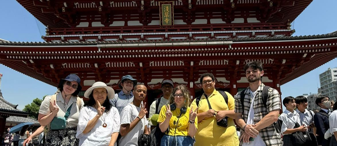 Study abroad group in front of Japanese temple.