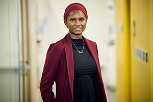 Umu Jalloh stands in a lab